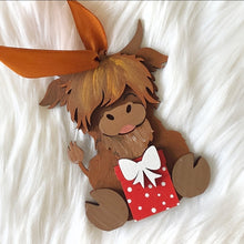 Load image into Gallery viewer, Highland Cow with Present Bauble

